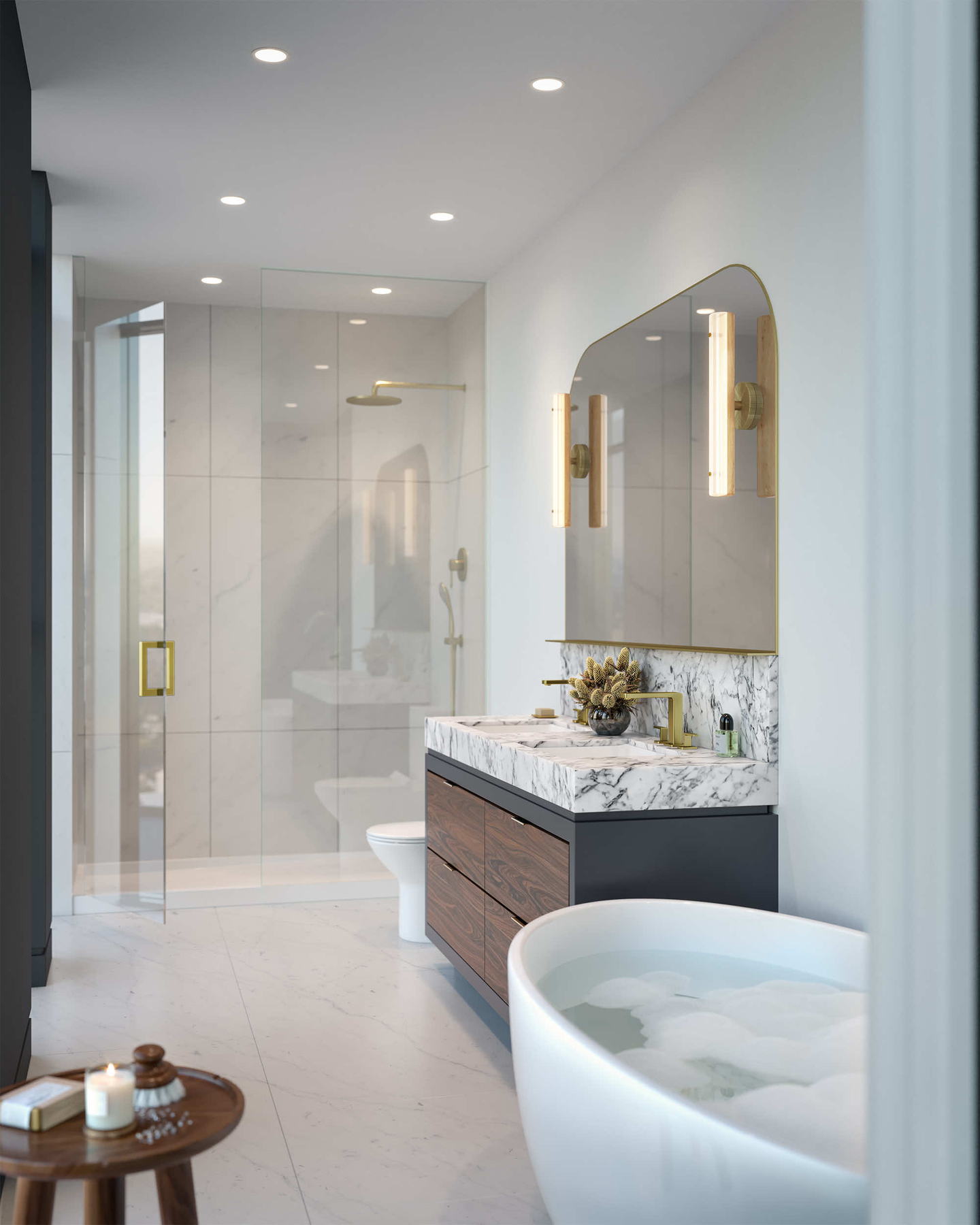 Suite ensuite by Studio Munge with white marble, brass fixtures, a freestanding tub and walnut vanity