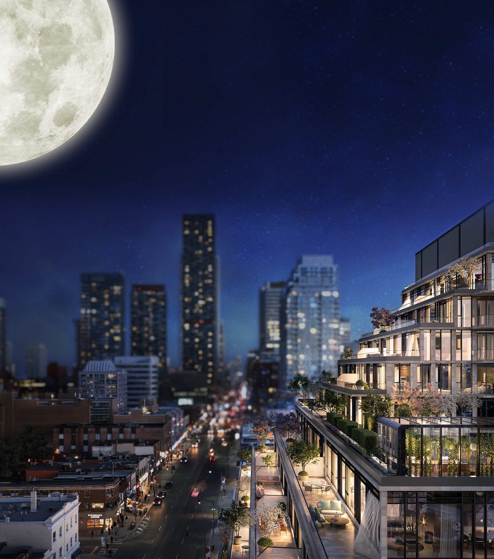 The Capitol's terraces at night above Yonge Street, with the Midtown skyline beyond